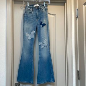 Hollister medium wash jeans boot cut butterfly patch